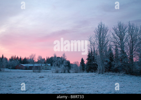Sunrise over snowy Norwegian landscape Stock Photo