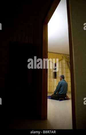 Muslim man praying, West Bank, Palestine Stock Photo