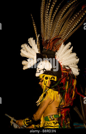 Aztec Drummer's Nighttime Performance in San Miguel's Plaza Stock Photo