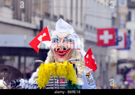 Parade of masked people during the Carnival in Basel, Switzerland. Stock Photo