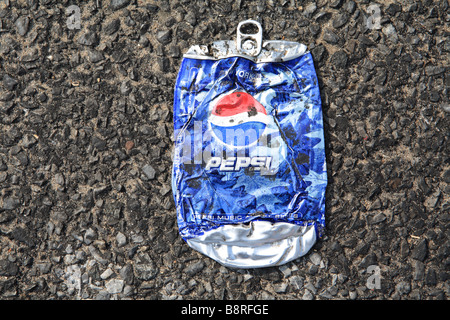 close up discarded pepsi can rubbish on forest floor Stock Photo - Alamy