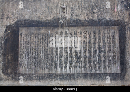 Chinese text engraved on stone in the Stele Forest museum in the Confucius Temple of XI'an, Shaanxi Province, China. Stock Photo