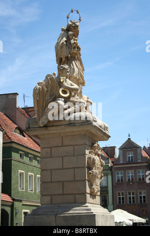 Statue of St John Nepomuk on Old Town Square over Renaissance Town Hall , Poznan, Poland