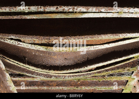 Old rusty metal sheets bended. Stock Photo