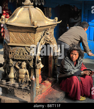 Nepal Kathmandu Durbar Square small street shrine people Stock Photo