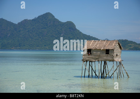 Bajau Laut house built on stilts in lagoon Pulau Maiga Semporna Sulu Sea Malaysia South east Asia Stock Photo