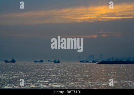 Sunset with boats on the Bosphorus in Istanbul. Stock Photo