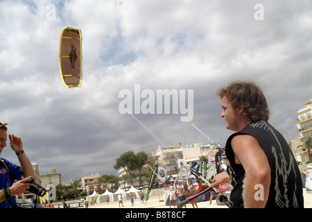 man with his kite at the beach, Spain, Balearen, Majorca Stock Photo