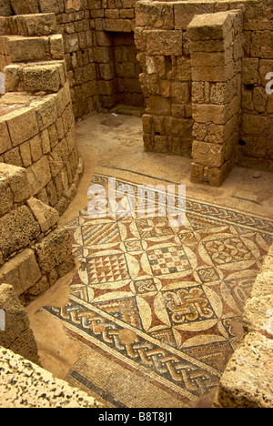 Geometric figure design tile floor mosaic in ruins of house room in King Herod built port city Caesarea Stock Photo