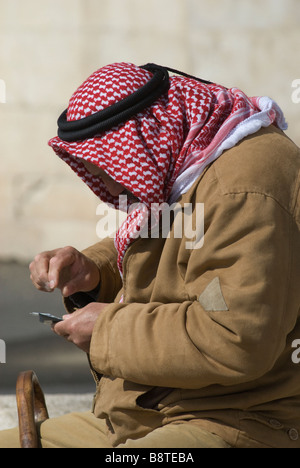 Palestinian man wearing keffiyeh israeli hi-res stock photography