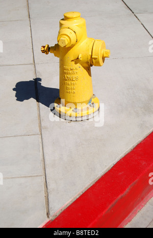 Fire hydrant on sidewalk, Los Angeles, California, United States of America Stock Photo