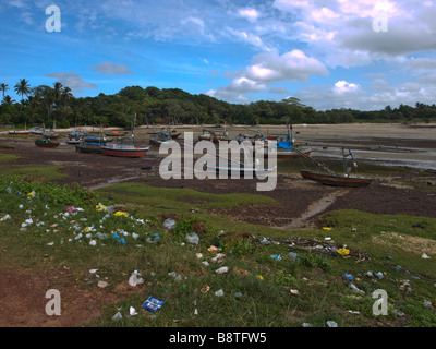 Stranded fishiing boats at low ebb near Joanes on Ilha do Marajo Island in the Amazon, Para state, Brazil. Stock Photo