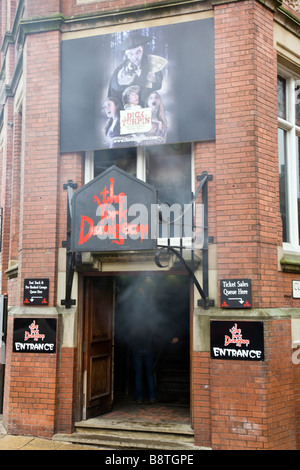 york dungeon attraction entrance city of york great britain europe with smoke pouring out the open door Stock Photo