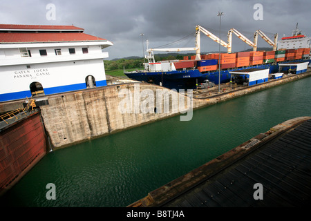 The Panama Canal lock system with lock gates closed and ship entering a ...