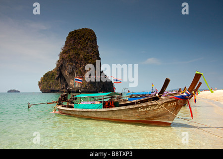 Phra Nang Beach: Long-Tail Boat with Rock Stock Photo