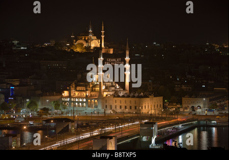 New Mosque Yeni Cami with Golden Horn and Galata Bridge in Front and Nuru Osmaniye Mosque in Background Istanbul Turkey Stock Photo