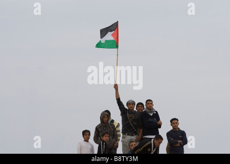 Young Israeli Bedouins take part in protest against Israel's military operation in Gaza Strip in the village of Ar'arat an-Naqab, Negev desert Israel Stock Photo
