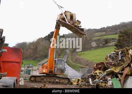 The clear up after the MSC Napoli shed its cargo now washed up on the beach at Branscombe Devon Stock Photo