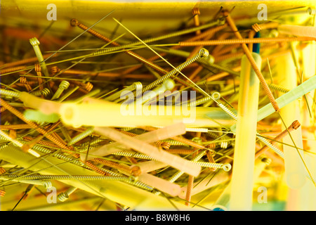 Close up view of open sharps box showing used acupuncture needles Stock Photo