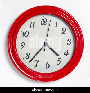 Red Wall Clock Stock Photo