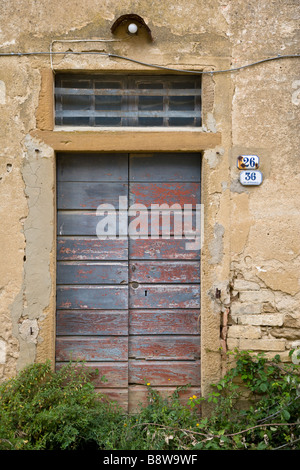 A dilapidated rural doorway in Petrognano, Tuscany, Italy. Stock Photo