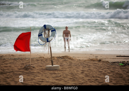 Buoy with red flag Stock Photo - Alamy