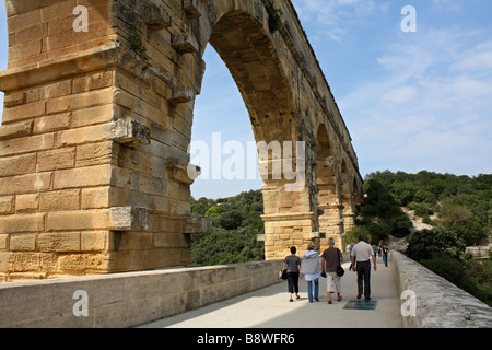 The Pont du Gard is a Roman aqueduct located in Vers-Pont-du-Gard near Remoulins, in the Gard département, south of France Stock Photo