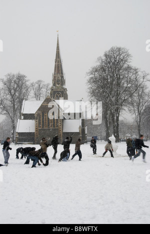 Teenagers playing in the snow during the February 2009 snow storm Stock Photo