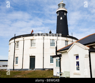 The Old Lighthouse and a round building at Dungeness in Kent, UK Stock Photo