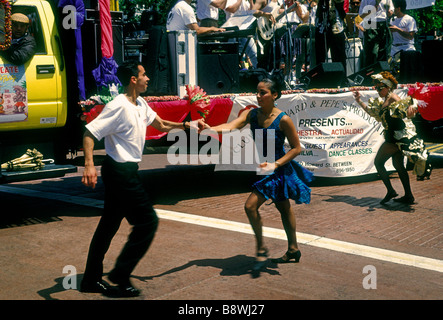 Hispanic people, young man, young woman, couple,  dancers, dancing, Cinco de Mayo Festival, Mission District, San Francisco, California Stock Photo