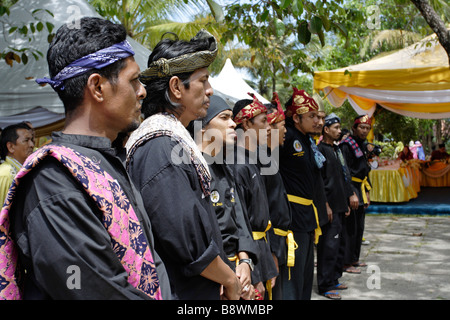Malay men wearing traditional silat dress in Malaysia. Silat is a Malay art of self defence. Stock Photo