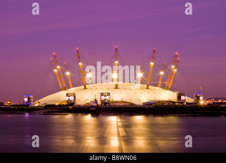 Millenium O2 Dome on river Thames at night, London, England, UK Stock Photo