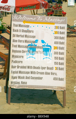 Advertising massages on a tropical island beach at Chaweng Noi, on Koh Samui's northeast coast Stock Photo