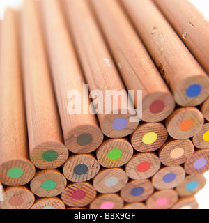 A stack of wooden coloured / colored pencils Stock Photo