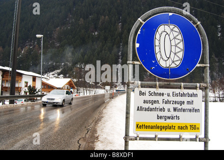 traffic sign on winter road Mayrhofen Austria Stock Photo