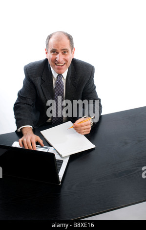excited senior executive in office desk middle age man Stock Photo