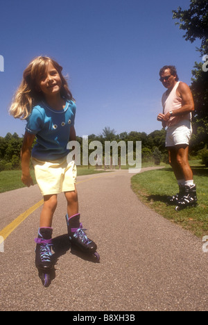 Young Girl Roller blading Stock Photo