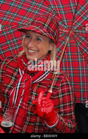 head and shoulders portrait of smiling lady at Maastricht Carnival Netherlands Stock Photo