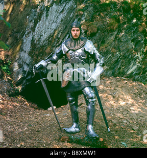 Medieval knight in shining armour with sword Wales UK  KATHY DEWITT Stock Photo