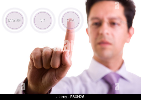 a businessman pressing the YES hi tech button Stock Photo
