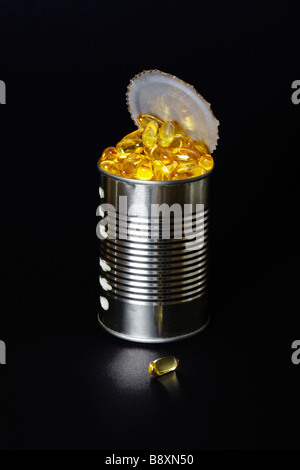 Fish Oil Capsules in an open Tin Stock Photo