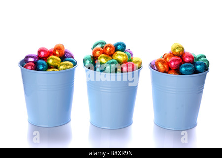 Chocolate easter eggs in boxes over white Stock Photo