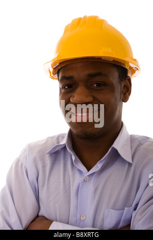 african engineer smiling over a white background selective focus Stock Photo