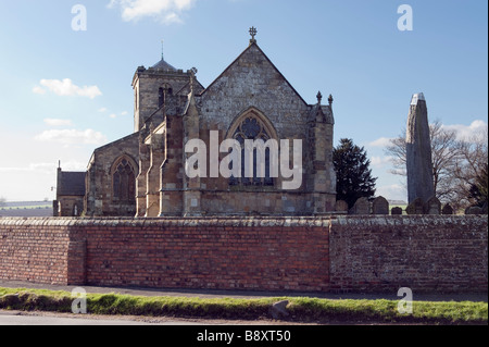 Rudston 'All Saints' Church and monolith 'East Yorkshire' Humberside 'Great Britain' Stock Photo