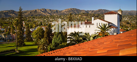 Detail red tile roof and view of houses on mountainside panoramic Stock Photo