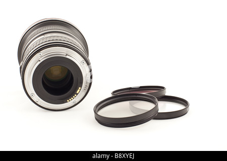 Photo lens and three filters on the white background Stock Photo