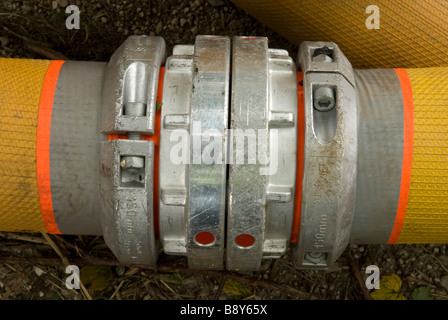 Yellow hose coupling from High Volume Pump used by UK Fire & Rescue Service Stock Photo