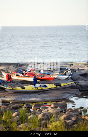 Kayaks on a rock by the sea Sweden. Stock Photo