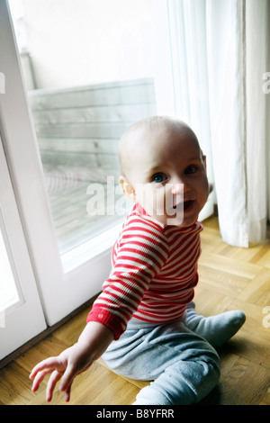 A smiling girl playing Sweden. Stock Photo