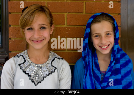 Indian sisters mixed race Stock Photo